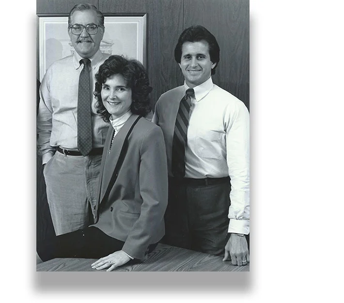 Historical CPM photograph of Joe Cotchett with colleagues
